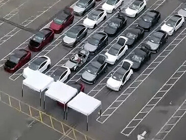 The cheaper crossover's body seams smaller than that of the new Model Y Juniper next to it.