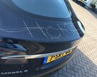 A defaced Tesla Model S. Elon Musk proposes Tesla cars can raise the alarm to prevent keying (Image source: John Vermetten via Autogespot)