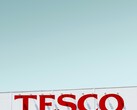Tesco exterior signage photographed against a clear sky (Image source: Simone Hutsch via Unsplash)