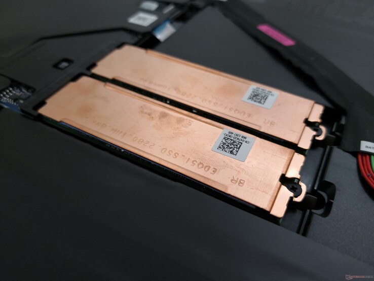 Copper plates to aid in SSD heat dissipation. Most other laptops do not offer any cooling at all for NVMe SSDs