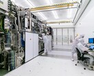 Russia targets 28-nanometer chip production by 2030, but gaps remain. Pictured: ASML clean room with engineers working on photolithography equipment (Image source: ASML)