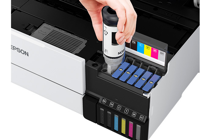 The Epson ET-8550 can be refilled using inexpensive ink from bottles.