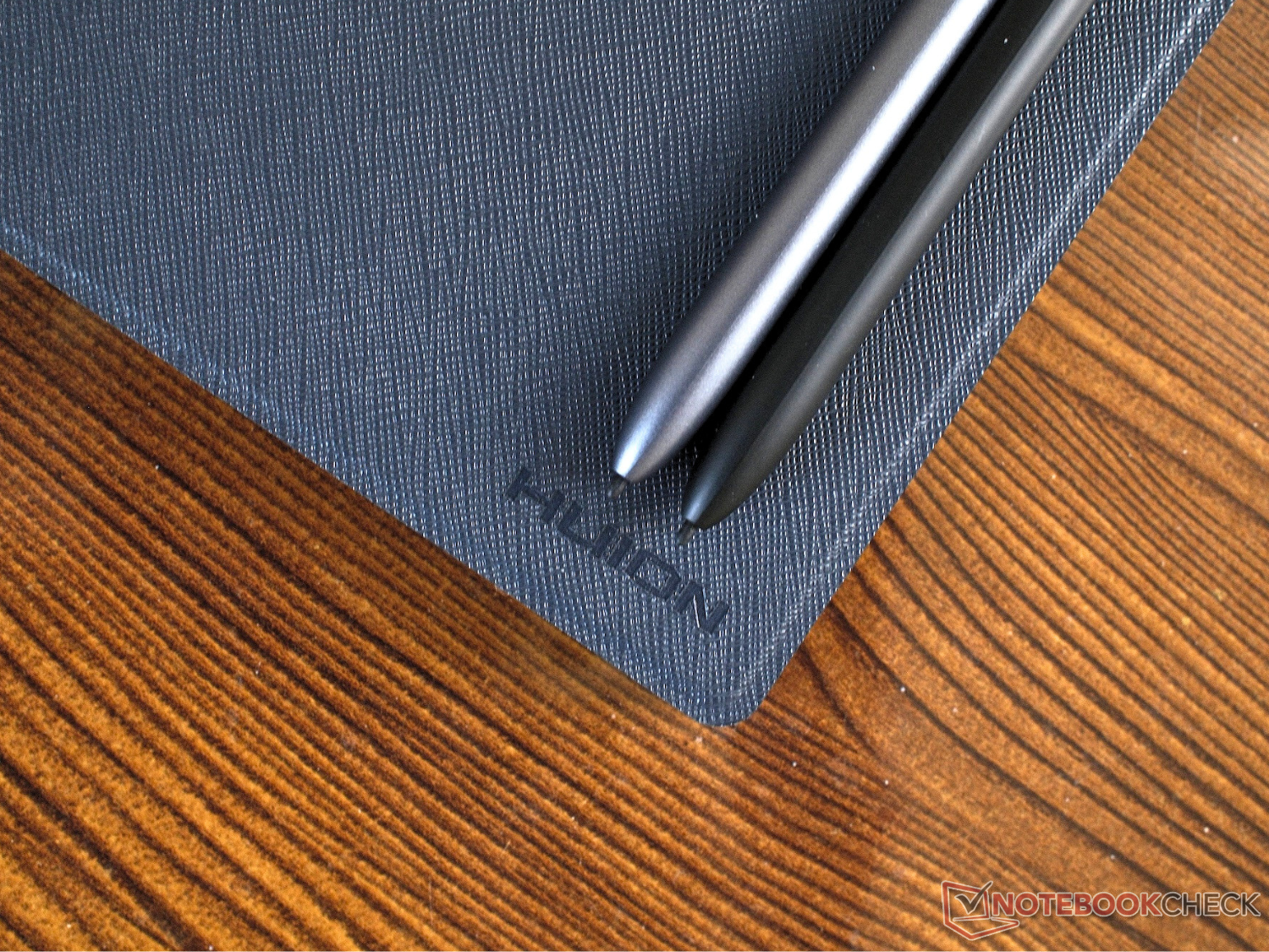 Both the Huion Ink and Note E come with styluses, albeit different models.