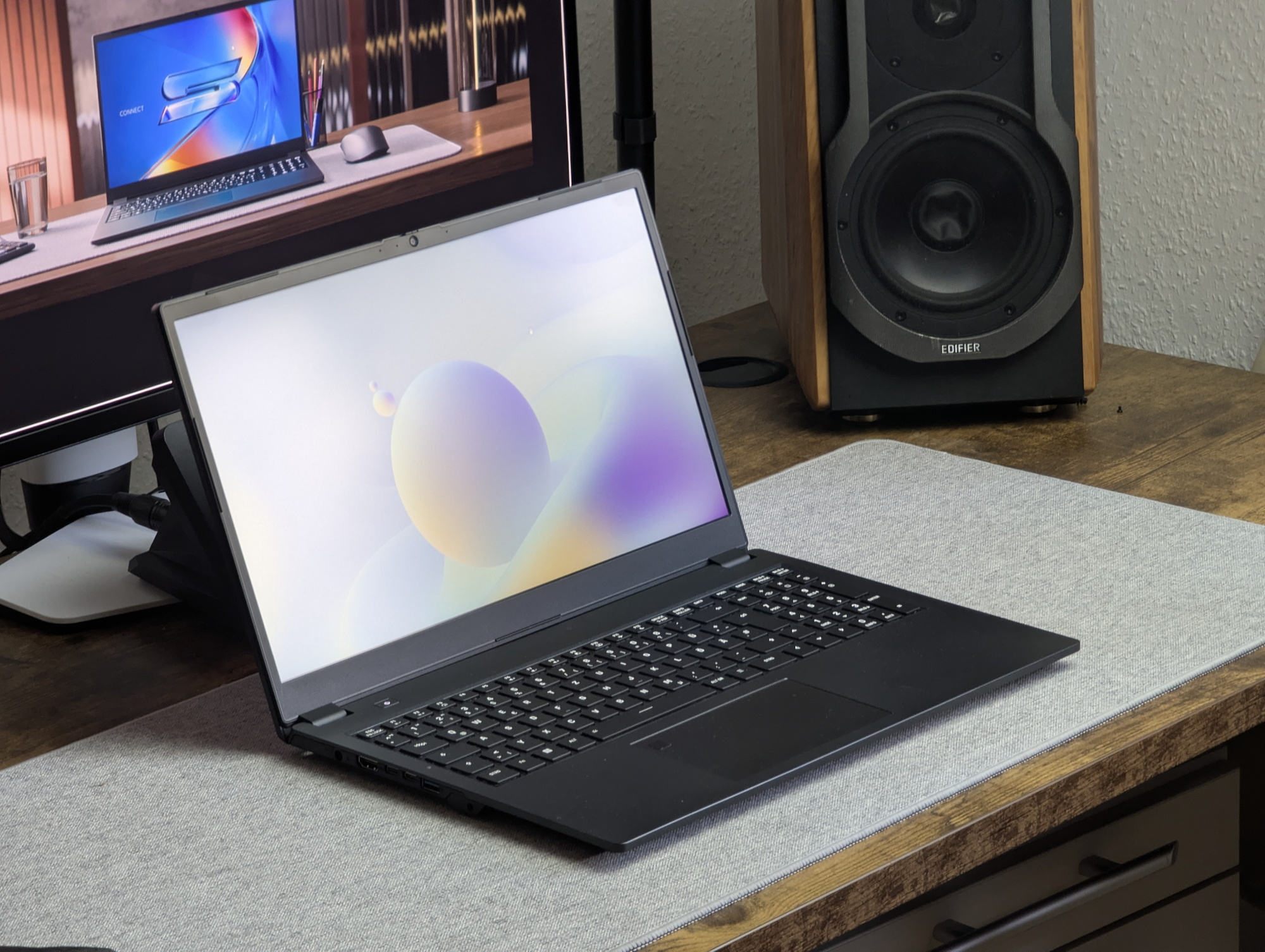 Schenker Connect 15 on a grey surface on the desk
