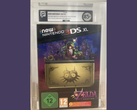 An 85+ graded New Nintendo 3DS XL Majora's Mask Limited Edition console sealed in an acrylic case (image source: r/consoles)