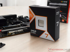 An image of the Ryzen 7 9800X3D box on a desk top.