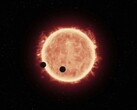 An illustration showing a star and two planets.