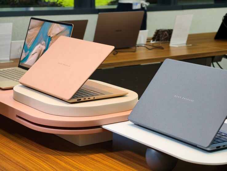 The 2026 Zenbook 14 Copilot AI notebooks come in Zabriskie Beige, Komodo Coral, and Arctic Blue (L to R).