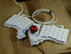 The ZSA Voyager has excellent per-key RGB: It is bright and can be used as an indicator for which layer you're on.