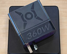 The Honor Win 360W laptop charger is said to be compatible with multiple laptops. Pictured: the adapter on top of a weight scale.