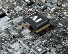 A decorative image showing a chip with the acronym "AI" written on it