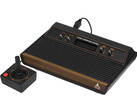 A retro video game console, the Atari 2600, photographed against a plain white background. (Image Source: Evan-Amos on Wikimedia Commons)