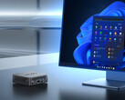 The NUC150 can be equipped with either the Intel N150 or the Core 3 N355. Pictured: a promo image of the mini PC sitting next to a monitor. (Image source: Minix)