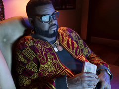 One of Grand Theft Auto VI's characters, Boobie Ike holding a bundle of cash