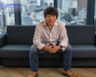 A picture of Hideaki Itsuno sitting on a couch at Tencent LightSpeed Studios (image source: LightSpeed Studios)