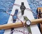 Three Citizen Promaster Dive watches with white, black, and blue dials, each featuring a matching dive bezel and urethane strap.
