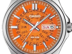 A close up shot of the orange MTP-E740-4AV with its transparent dial revealing the day and display wheels underneath.