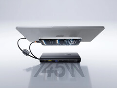 The 145W power bank can recharge 4 devices at the same time. Pictured: a promo picture showing it recharging a phone and a laptop.