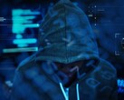 A hooded figure representing the cybercriminal threat behind the Carnival data breach.