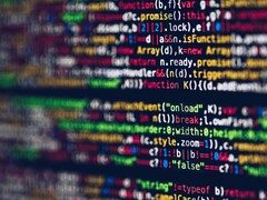 Blurred, colorful program code on a screen