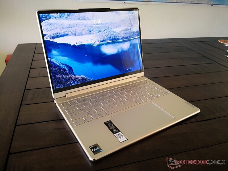 Intel Core NotebookCheck.net - 9 14IAP7 review debut: Lenovo i7-1260P Reviews convertible Yoga