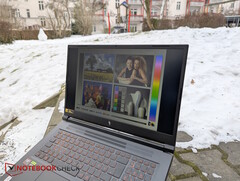 Dim display of the Acer Nitro V 17 in the open