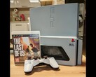 A custom hand-built “PS3 Slim Pro” with a 30th Anniversary logo beside a DualShock 3 controller and The Last of Us box. (Image source: Fun-Equivalent-7785 via Reddit /r/PS3)