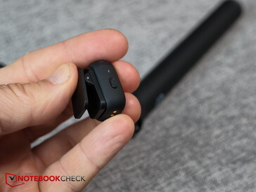 Very small clip-on microphone - the clip sticks with a magnet an can be removed