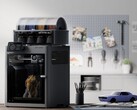 A promotional photograph of the Bambu Lab X2D 3D printer