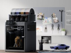A promotional photograph of the Bambu Lab X2D 3D printer