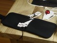ZSA Voyager fits into its travel pouch with the TRRS cable connected.