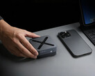 The small size of the Neo N95 mini PC showcased by putting it besides a phone
