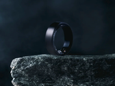 The Soxai Ring 2, pictured in a matte black finish on the edge of a rock against a dark background. (Image source: Soxai)