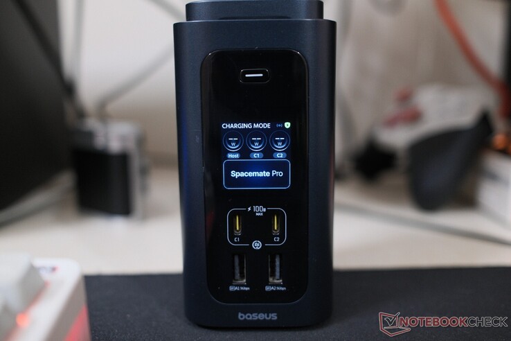 The display shows you which ports are in use, in addition to the wattage being supplied.