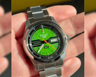 Pictured - the Seiko 5 SRPM09 HUF edition held in a hand.