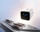 The Anker Nano Charger (45W, Smart Display, 180° foldable) is about to launch in the US. Charger pictured next to a phone. (Image source: Anker)