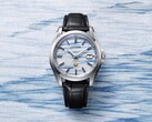 Citizen AQ4090-08A displayed on an indigo washi paper background, emphasizing the handcrafted dial's blue mist-like pattern.