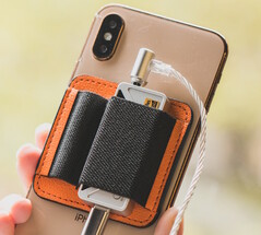 The optional Magnetic Dongle Holster attaches to any MagSafe phone.