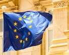 EU flag flying in front of historic architecture