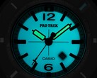 Casio Pro Trek PRJ-01AE-8 glowing turquoise in the dark, with illuminated hands and dial.