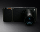 The Find X9 Ultra with a teleconverter accessory attached.