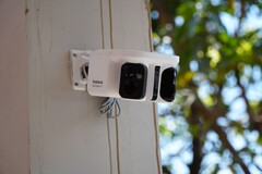 Baseus Security X1 Pro camera mounted on a wall.