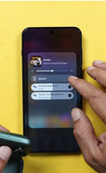 OnePlus dual audio feature in action, with two pairs of wireless earbuds connected at the same time and shared listening enabled.