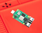The carrier board doesn't ship with a CM5. Pictured: a TV stick setup with the Compute Module 5.