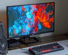 The Titan Army P275MV PLUS behind a gaming keyboard