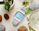 The Casio AQ230A-2A1M stylized on a tabletop in an aesthetic manner.