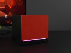 Steam Machine mini PC with a red front panel and RGB lighting