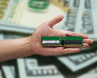 DIY DDR5 RAM could soon become a viable approach to save money on PC builds. Pictured: a person holding a RAM stick. (Image source: SK Hynix and Giorgio Trovato)