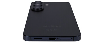 Bottom: Speakers, USB, microphone, SIM