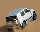 Electric off-road vehicle on the sand dunes of Dubai.